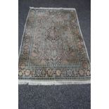 An Indian cotton floral rug, with central medallion, 192 x 123cm.