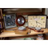 A vintage French electric wall clock; together with three aneroid barometers, and a picture clock.