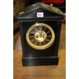A late 19th century ebonized mantel clock, or architectural form, 40cm high.