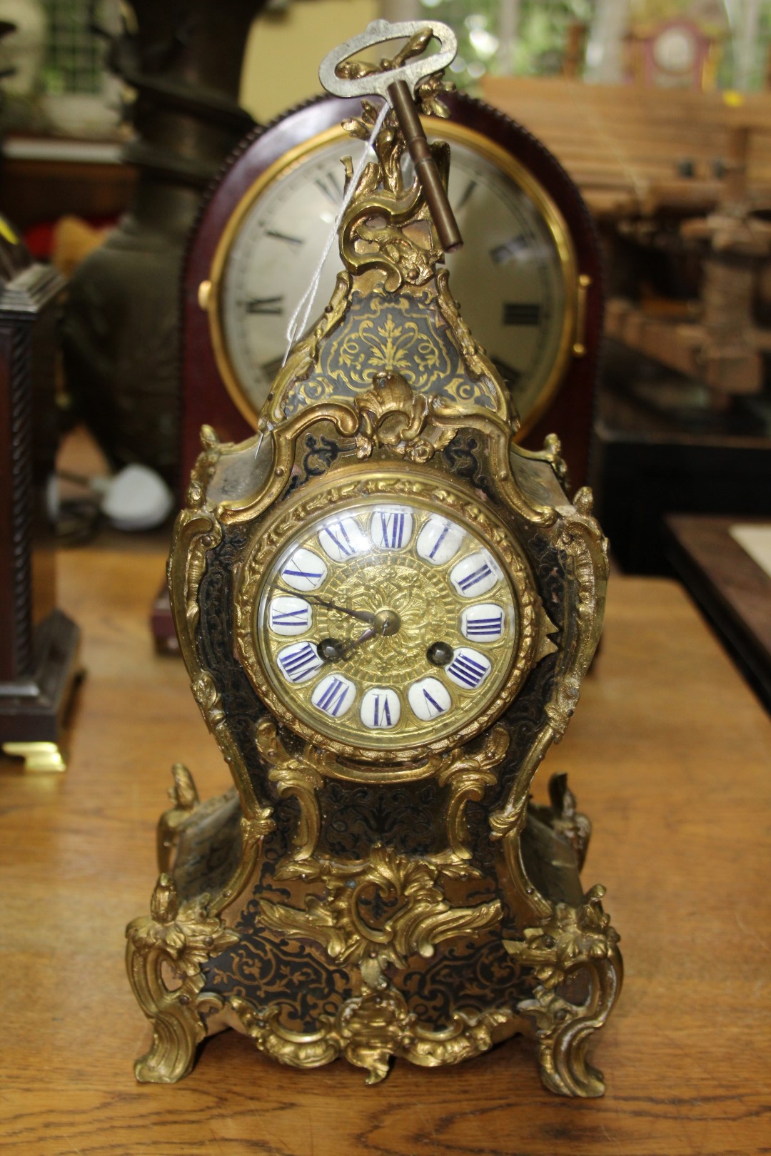 A late 19th century, Louis XVI style, tortoiseshell boulle mantel clock, 35.5cm high.