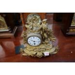 A late 19th century gilt metal mantel clock, 28cm high.