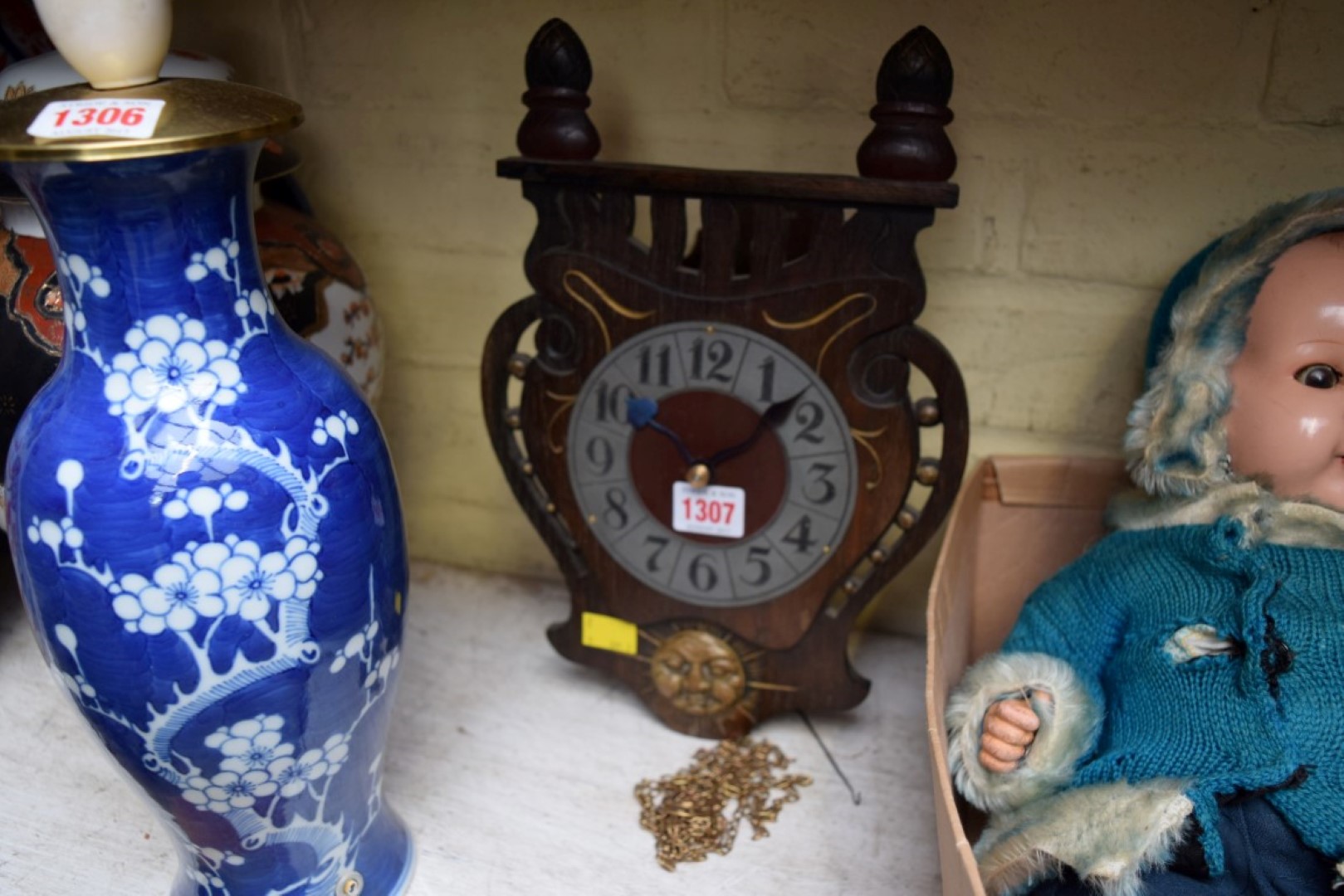 An art nouveau Black Forest style wall clock, 32cm high.