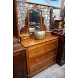 An antique walnut mirror back dressing chest, 95cm wide.