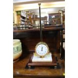 A Thwaites & Reed rack clock, 52cm high.
