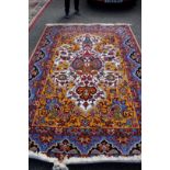 A Persian design floral carpet, with large central cream medallion, 303 x 202cm.