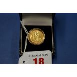 An Elizabeth II half sovereign, in a 9ct gold ring mount. 8.5g total.