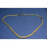 A fancy 14k gold necklet, 11.5g. Condition Report: Good used condition. Links firm.