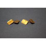 A pair of 9ct gold cufflinks, of chamfered rectangular form, 3g.