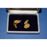 A pair of Chinese gold oval cufflinks, 5.5g.