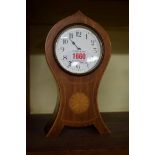 An Edwardian inlaid mahogany balloon mantel clock.