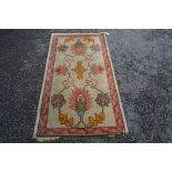 A small Ushak design rug, probably woven in Donegal, Ireland, en suite with the previous lot,