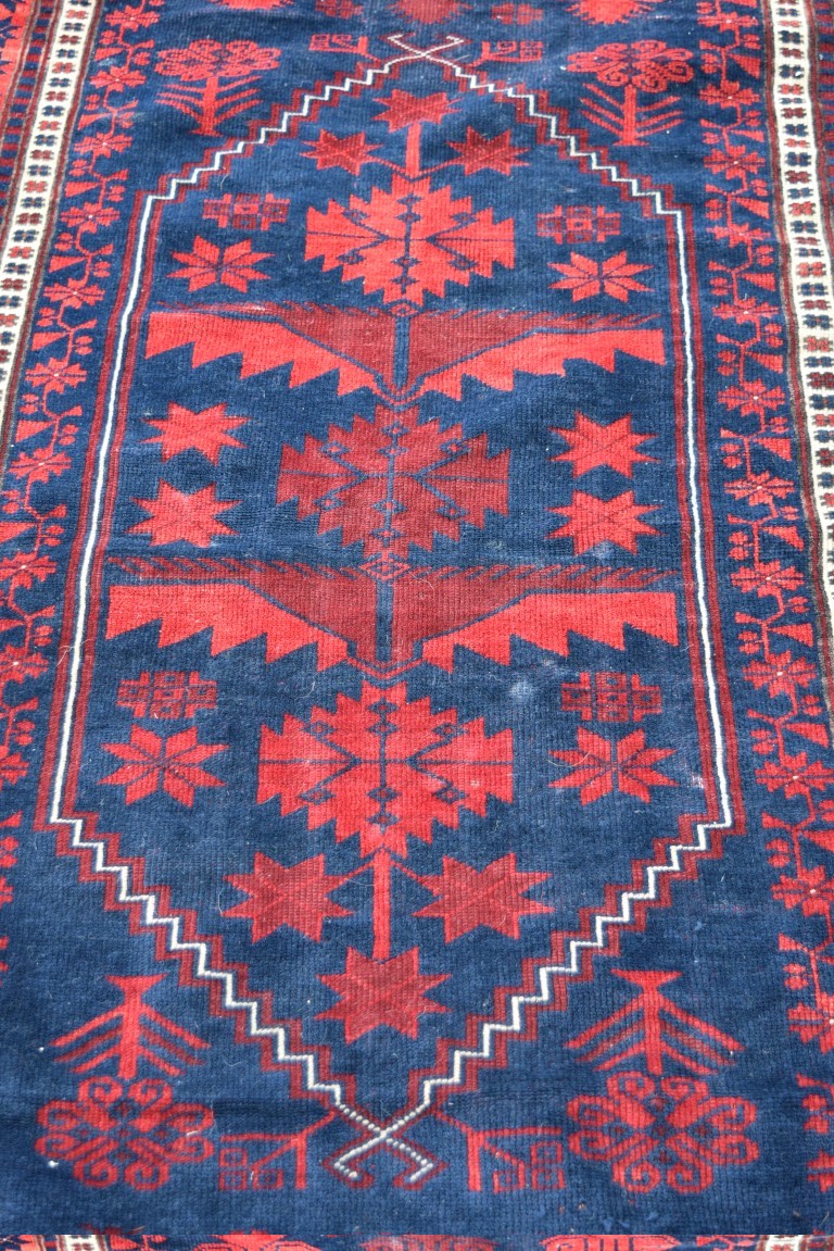 A Turkish 'Yagcibedir' rug, with large central medallion on a stylised floral blue field, - Image 2 of 4