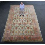 A very large ivory field Ushak design carpet, probably woven in Donegal, Ireland,