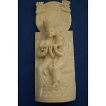 A Burmese carved ivory plaque, 13cm high.