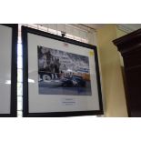 Formula One: a signed photograph of Jackie Stewart in Grand Prix car, 19.5 x 29.5cm.