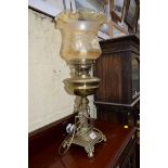 An old brass oil lamp.