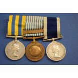 An Elizabeth II medal trio,