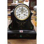 A late 19th century slate and malachite mantel clock, the enamel dial 'Hry Marc, Paris', 33cm high.