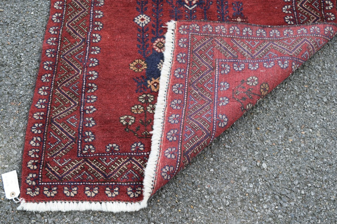 Two Pakistan rugs; together with a Pakistan Bokhara runner. - Image 10 of 10