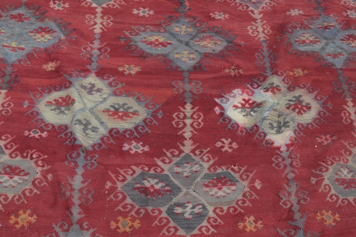 A large Turkish flat weave kelim carpet, with an all over geometric lattice design on a red field, - Image 5 of 10