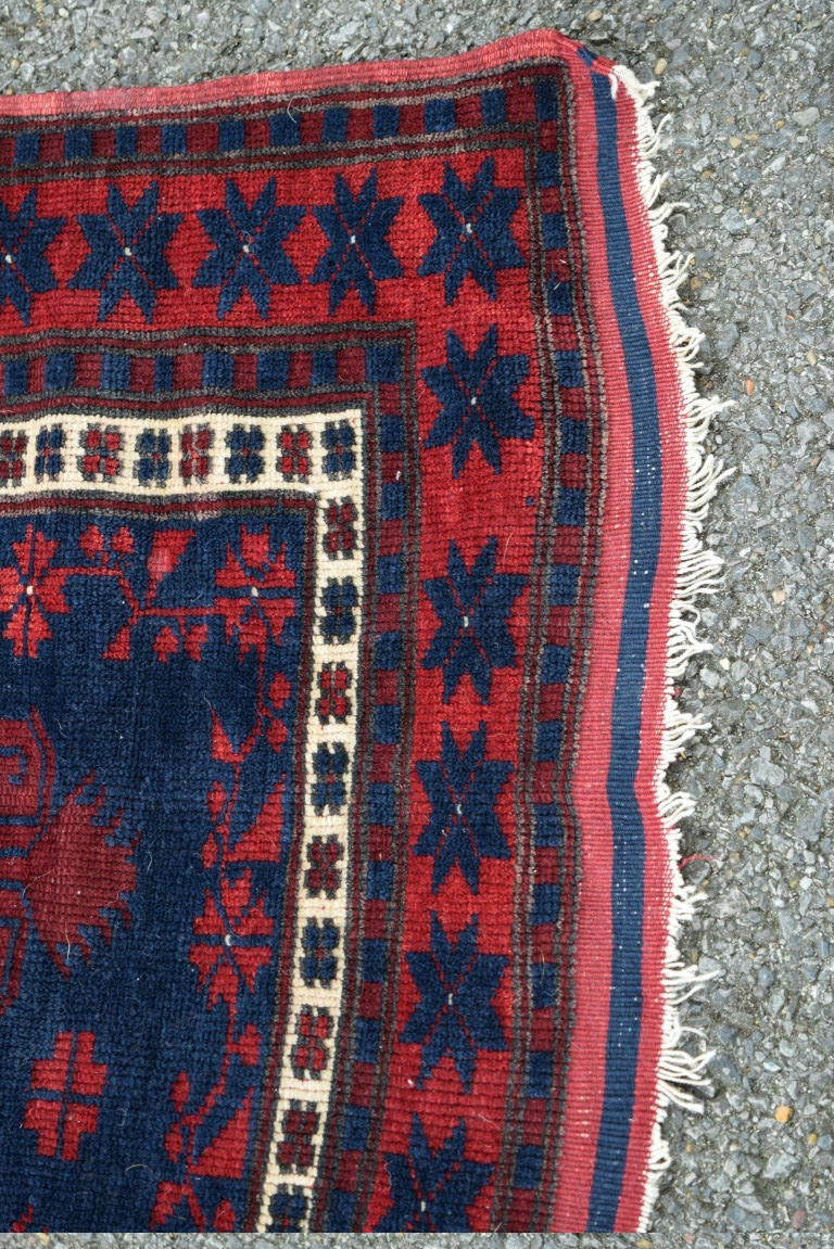A Turkish 'Yagcibedir' rug, with large central medallion on a stylised floral blue field, - Image 3 of 4