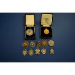 A collection of 1950s silver and other sporting medals to John Page,