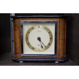 An Elliott walnut mantel clock, 18cm wide.