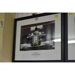 Formula One: a signed photograph of Jensen Button in Grand Prix car, 19.5 x 29.5cm.
