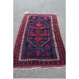 A Turkish 'Yagcibedir' rug, with large central medallion on a stylised floral blue field,