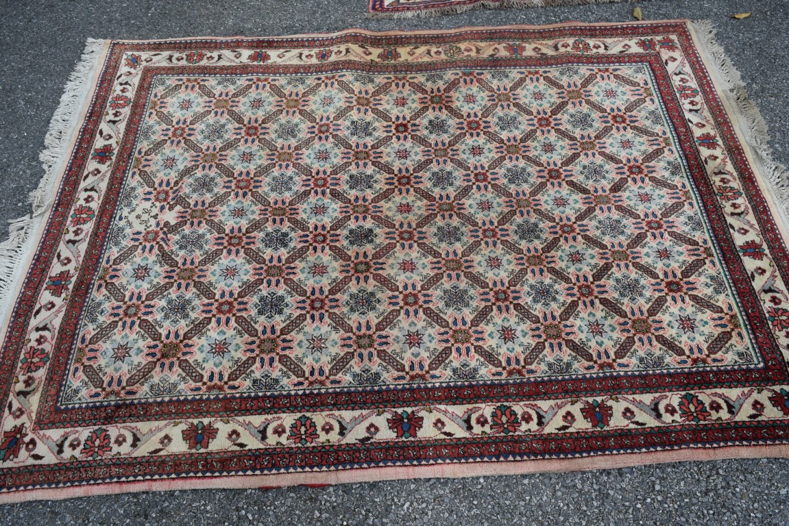 A Persian 'Abadeh' rug, with all over star lattice design on a cream field, 208 x 150cm.