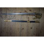 A Victorian naval officer's dress sword and scabbard, the scabbard bearing plaque 'Whiteman,