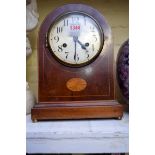 An Edwardian mahogany and inlaid dome top mantel clock, 30cm high.