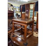 An antique Chinese chair, with inlay to the back.