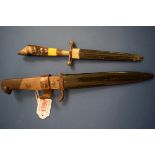 A German bayonet and sheath, the blade inscribed 'Nahkam Peer', total length 28.