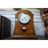 A circa 1900 mahogany and inlaid mantel clock, 31cm high.