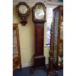 A George III mahogany eight day longcase clock, the 11½in dial with rocking ship to the arch,