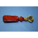 A Victorian unmarked swivel seal having carnelian handle, 8.