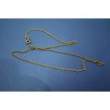 An unmarked necklace having 9ct gold clasp.