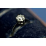 An unmarked diamond solitaire ring, measures 0.9-1ct on the Moe gauge.