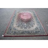 Two machine made rugs, with Persian floral medallion designs, 290 x 200cm.