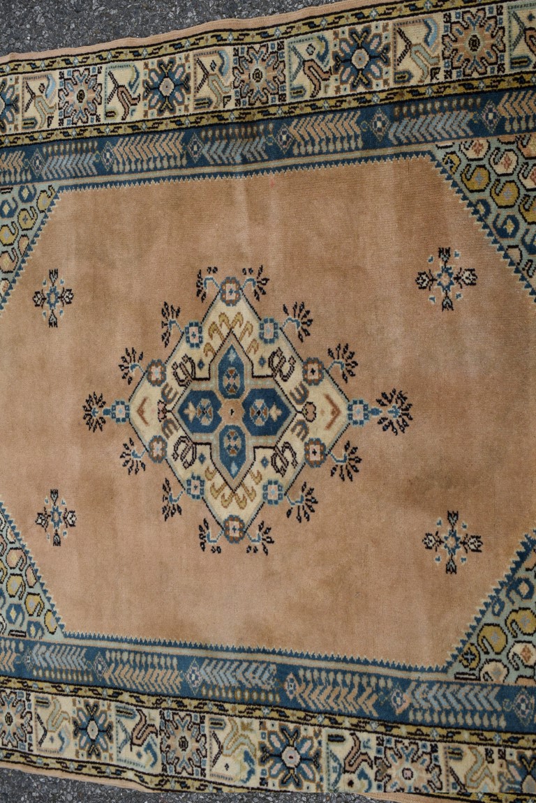 A Turkish rug, with central medallion on a salmon pink field, 150 x 115cm. - Image 2 of 4
