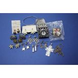 A small quantity of silver and other jewellery, to include a carved mother of pearl cross.