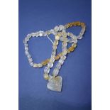 A naive antique rock crystal necklace.