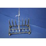 A Victorian silver six division toast rack, by Mappin & Webb, Sheffield 1891, 15.5cm, 317g.