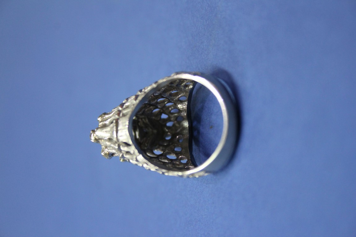 A marquise cut diamond in a 14k pierced mount, surrounded with diamonds (one missing). - Image 10 of 10