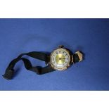 A 9ct gold vintage ladies wristwatch on silk strap.