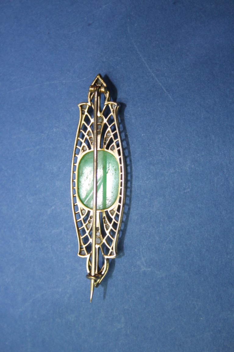 An Edwardian unmarked brooch set cabochon jade and mine cut diamonds. - Image 4 of 5