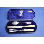 A cased Mappin & Webb silver plated christening knife, fork and spoon.