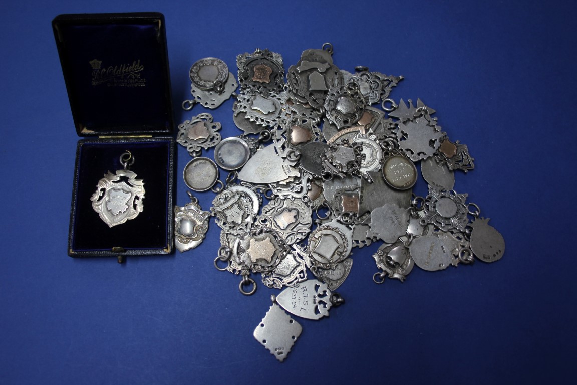 A collection of sixty one 19th and 20th century silver, enamel and metal medals.