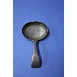 A George III silver fiddle pattern caddy spoon, by J S, London 1807, 16g.